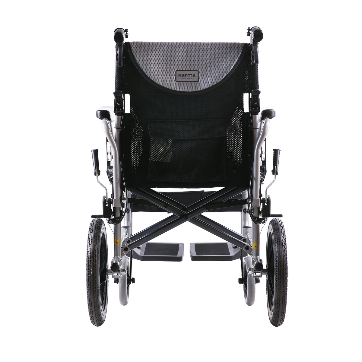 Karma Ergo 125 Transit wheelchair, rear view with attendant handles